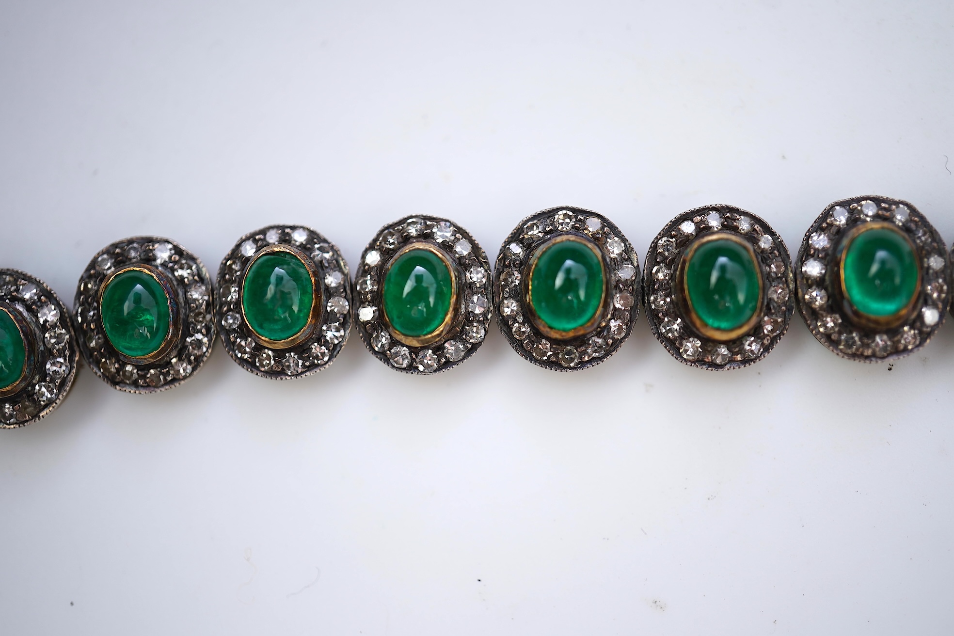 An emerald and diamond bracelet